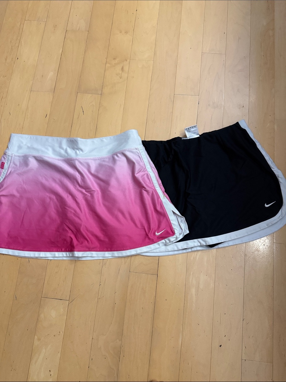 Nike Womenβs Pink Ombre and Black tennis skirts price is for both